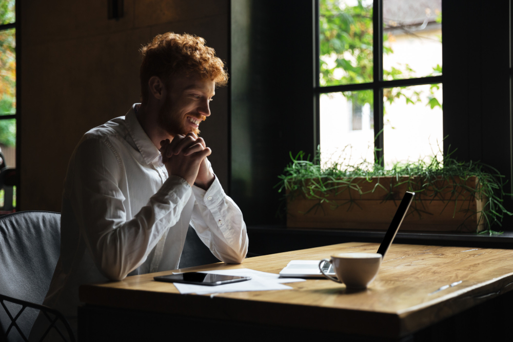 An early-stage founder assessing learning, attention, and commitment evidence with a startup idea validation consultant from SMELighthouse.