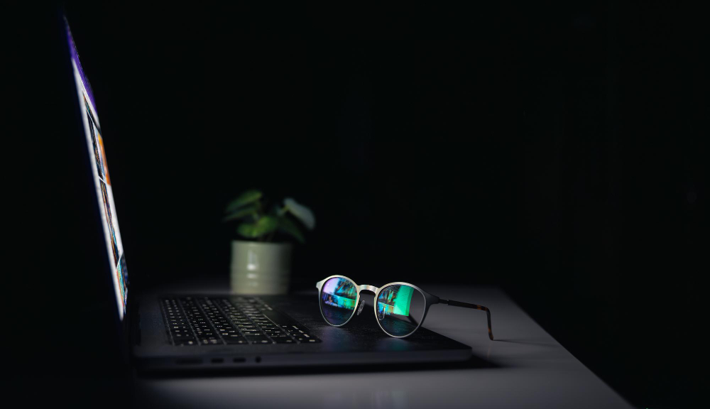 A modern laptop analyzing digital analytics to systematically validate a SaaS idea before building any features.
